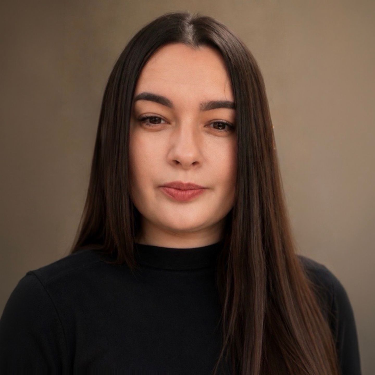 Daniela Moaca, Senior Manager IT at EOS Romania, portrait photo in a dark turtleneck.