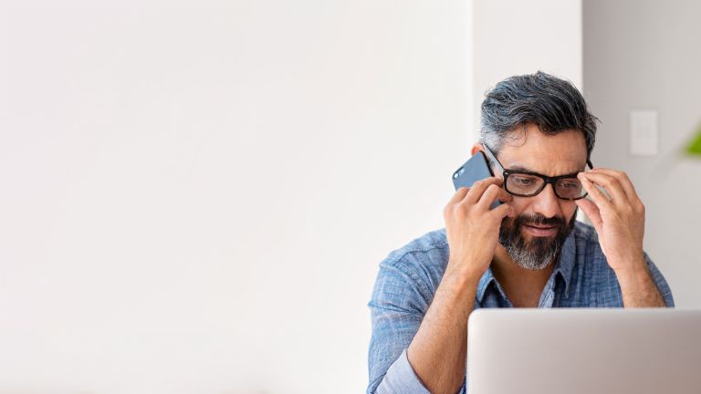 Man calling EOS customer service – personal consultation for outstanding debts
