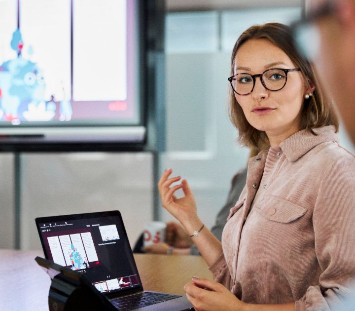 EOS employee presents a topic to customers
