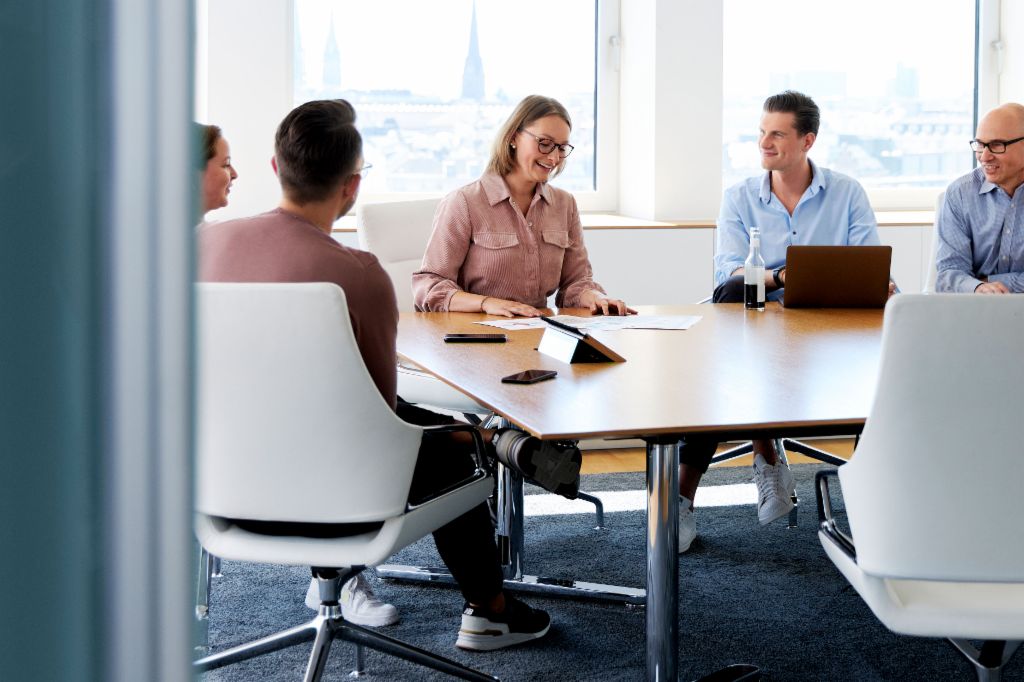 Group of EOS employees having a meeting